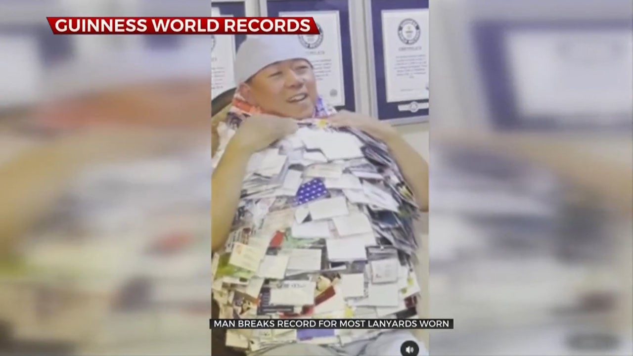 Man Breaks Guinness World Record For Wearing The Most Lanyards Around His Neck