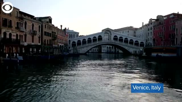 WATCH: Gondolas & Shops Reopen In Venice, Italy