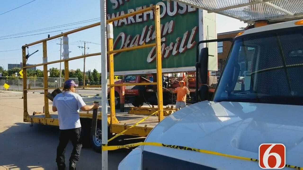 WATCH: Spaghetti Warehouse Sign Removed From Downtown Tulsa