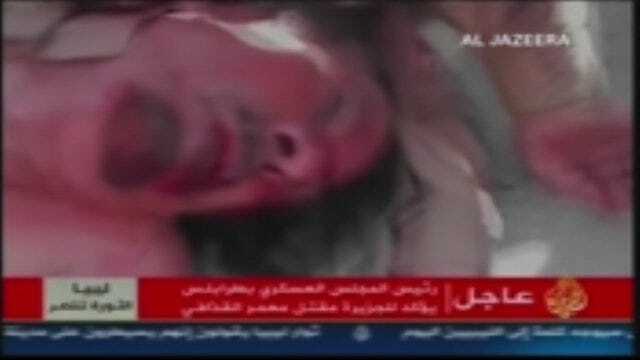 WARNING: Graphic Video Of Muammar Qaddafi's Death
