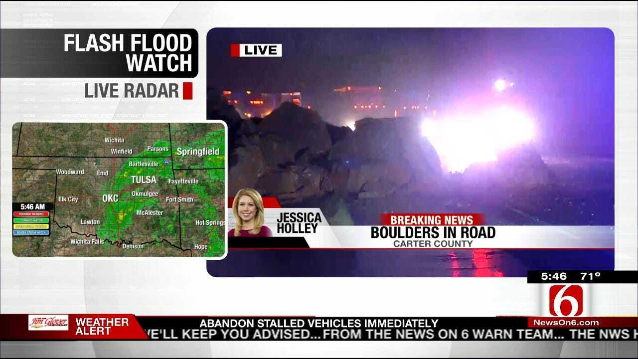 WEB EXTRA: Boulders Fall Onto I-35 During Live Report From Murray County