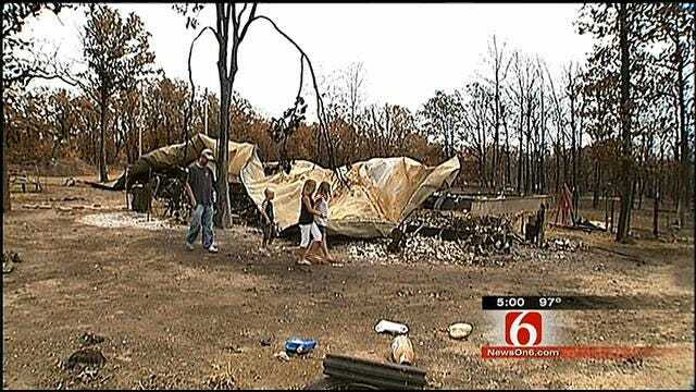 Looters Pick Through Debris Of Homes Burned In Wildfires