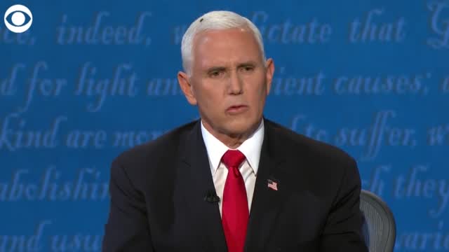 WATCH: Fly Lands On VP Pence's Head, Stays There During Debate