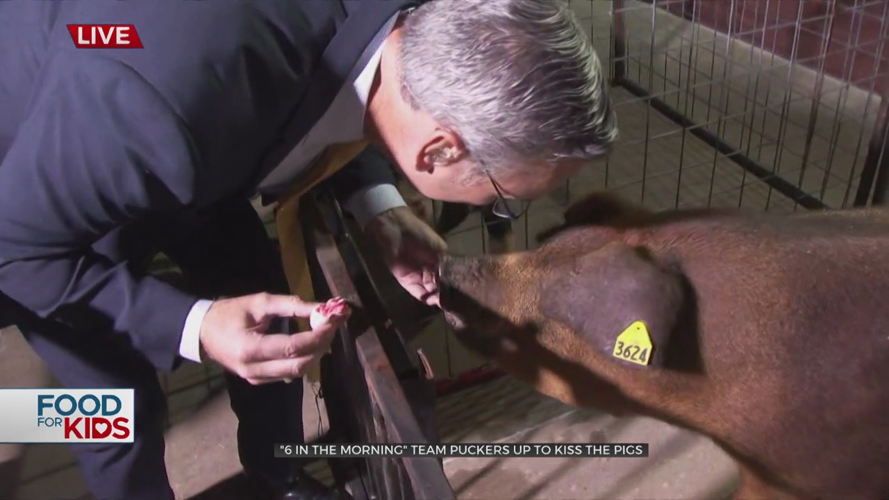 Six In The Morning Team Puckers Up To 'Kiss The Pig'