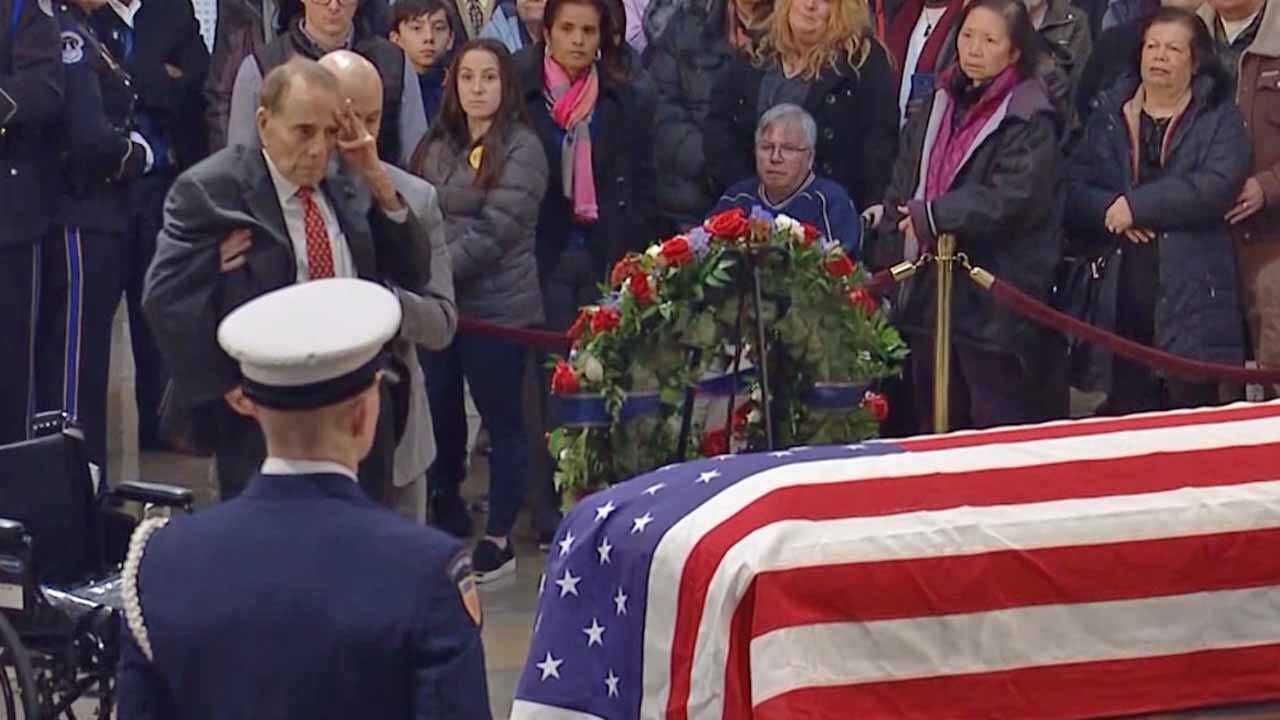 Bob Dole Rises From Wheelchair To Salute President George H.W. Bush