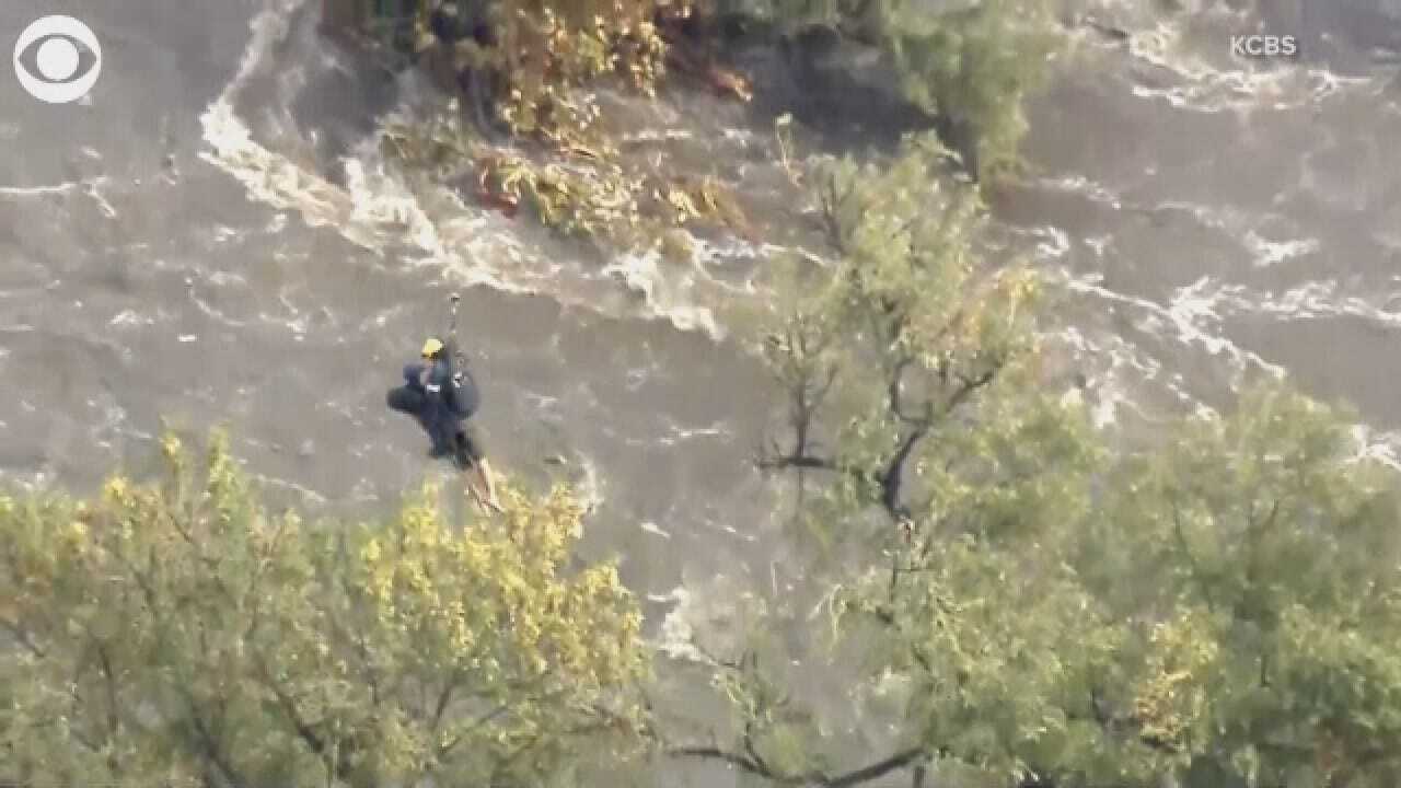 Firefighter Rescues California Man Trapped By Flooding