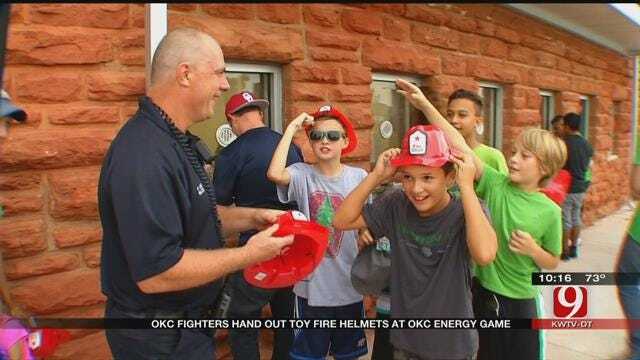 OKC Firefighters Hand Out Toy Helmets At Energy Game