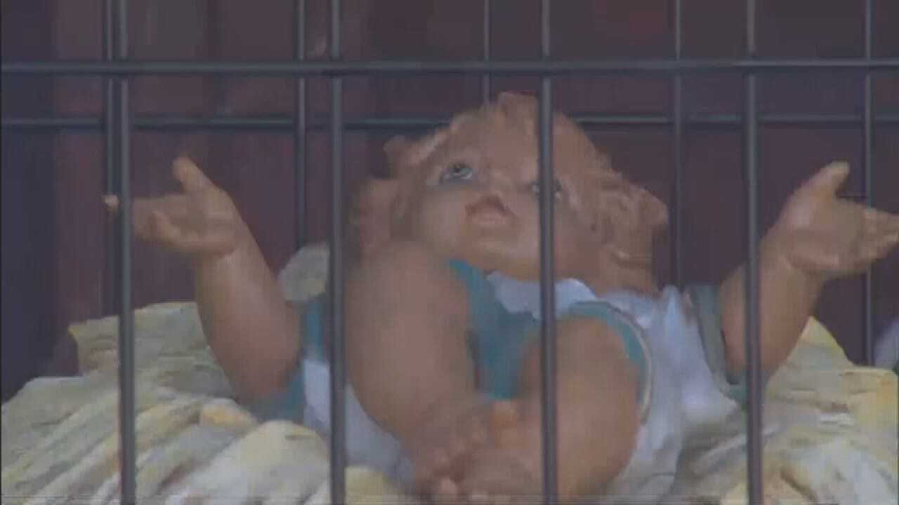 Baby Jesus Placed In Cage In Church's Immigration-Themed Nativity Scene