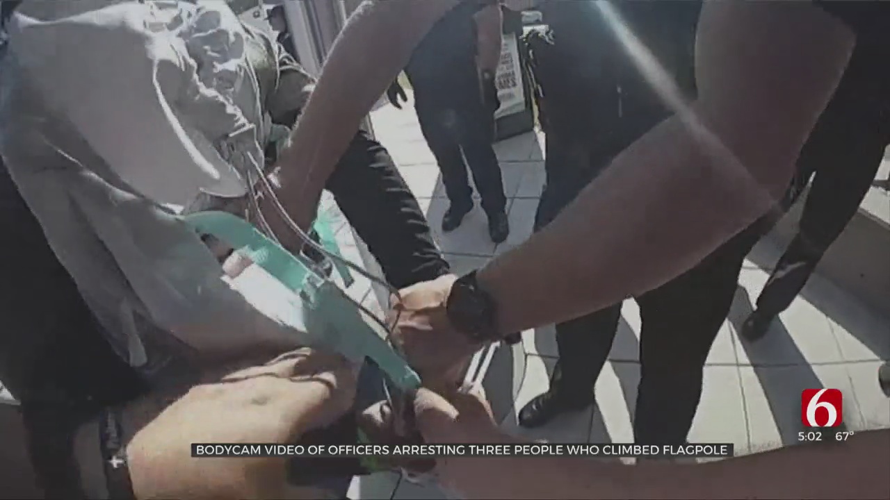 TPD Releases Video Of Arrests Of 3 People Who Climbed Flagpole At Presidential Rally 