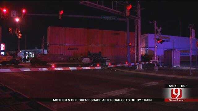Mother, Children Escape Before Vehicle Gets Hit By Train