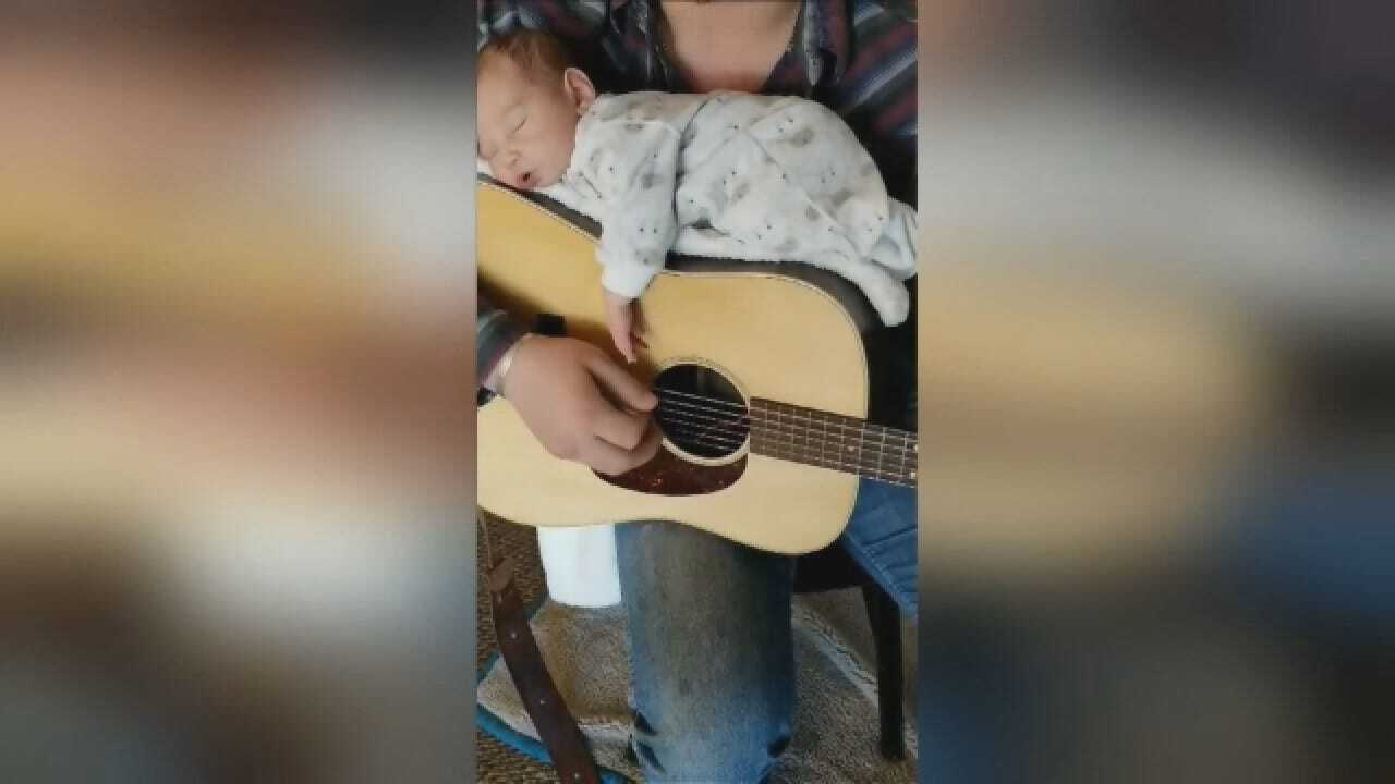 Dad Plays Guitar With Baby, Lulls Her To Sleep