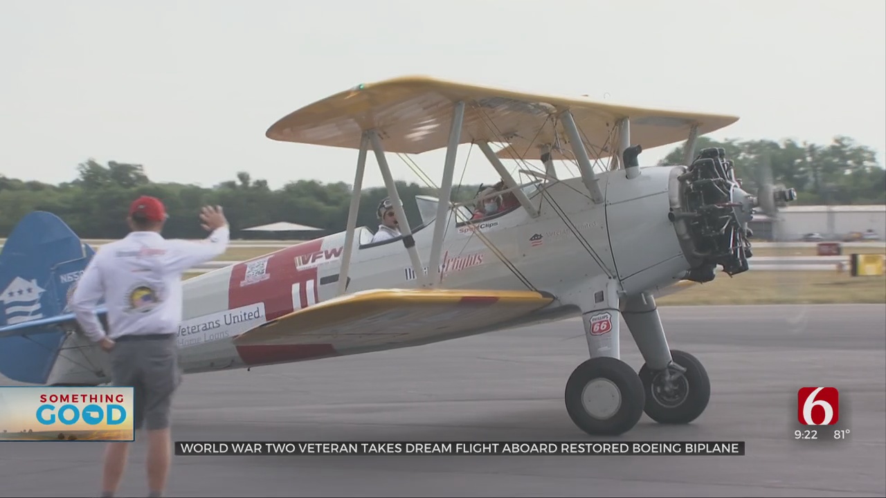 World War II Veteran Takes Dream Flight Aboard Restored Boeing Biplane 