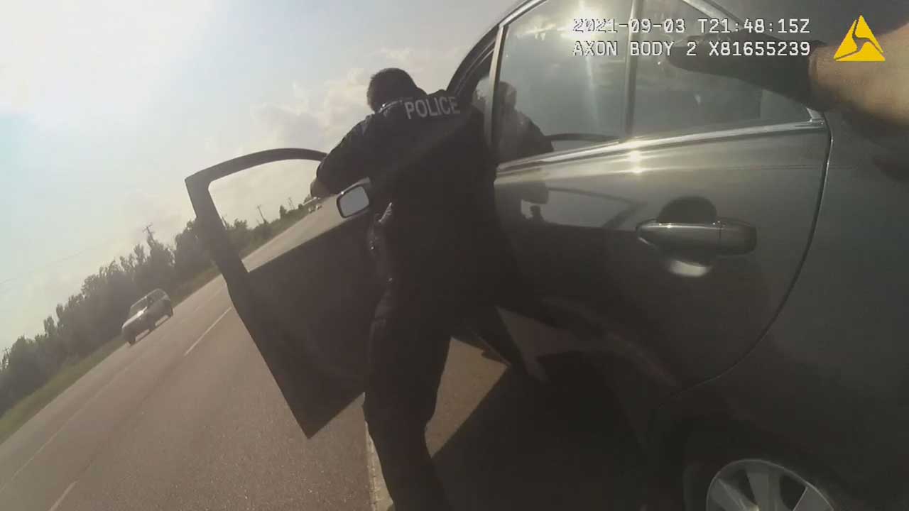 Bodycam Video Shows Harrah Officer Being Dragged By Vehicle Of Suspect 