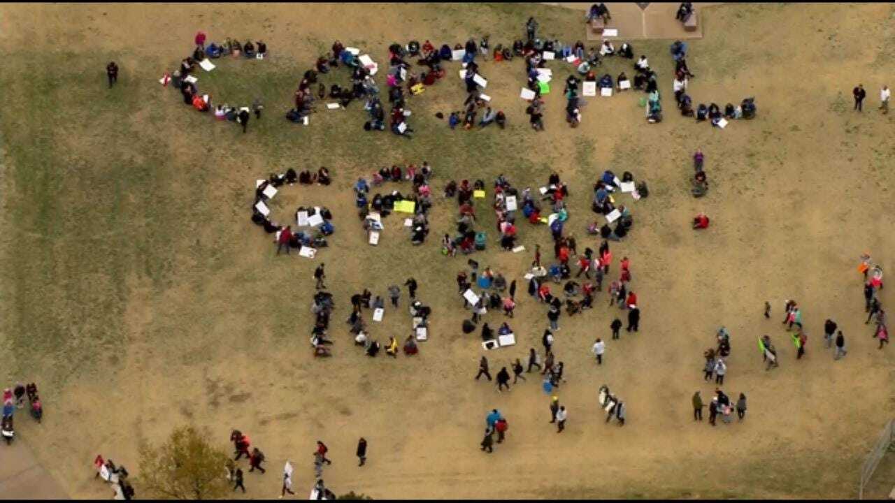 WATCH: Tulsa-Area Teachers Write Message On Capitol Grounds
