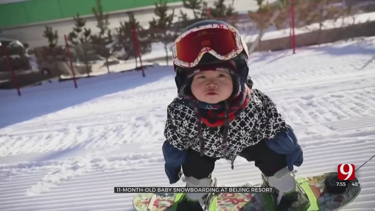11-Month-Old Baby Snowboarding At Beijing Resort