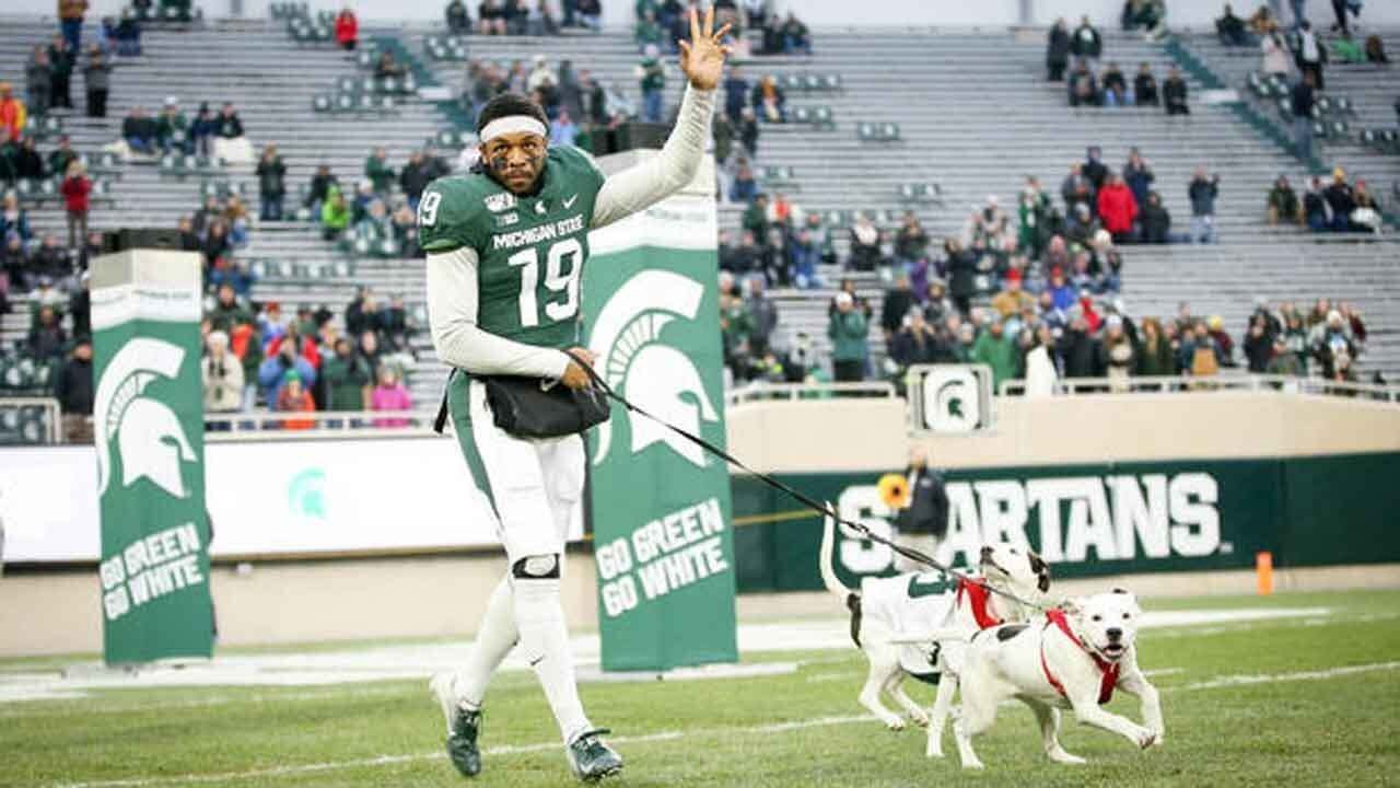 His Parents Died Before His Senior Day, So His Dogs Accompanied Him Onto The Field