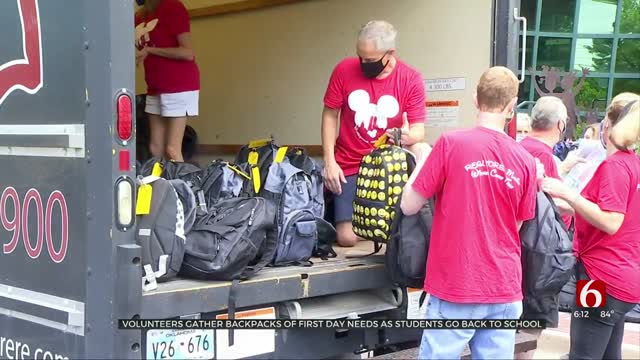 Volunteers Gather Backpacks Of First Day Needs As Students Return To School 
