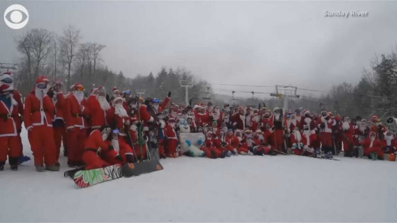 More Than 200 Santas Skied In Maine Charity Event