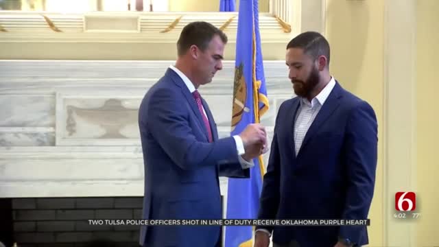 Gov. Stitt Awards State Of Oklahoma Purple Heart To 2 Tulsa Police Officers