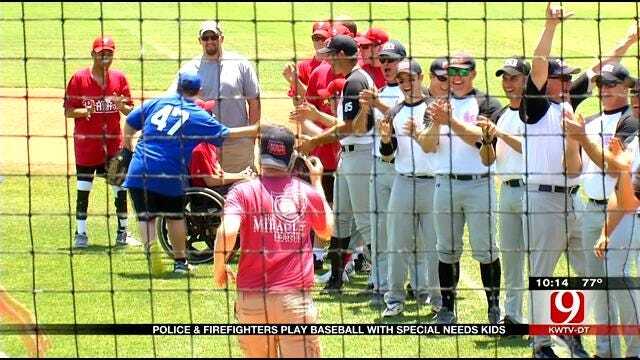 Edmond Police, Firefighters Play Baseball With Special Needs Children