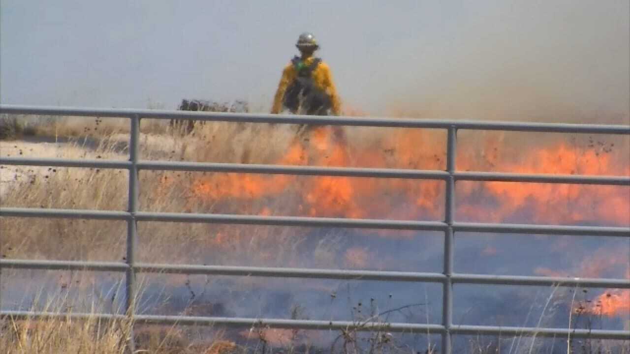 Firefighters Intentionally Burn Fields To Head Off Rhea Fire