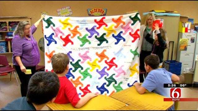 Beggs Middle School Students Present Quilt To News On 6 Meteorologist Dick Faurot