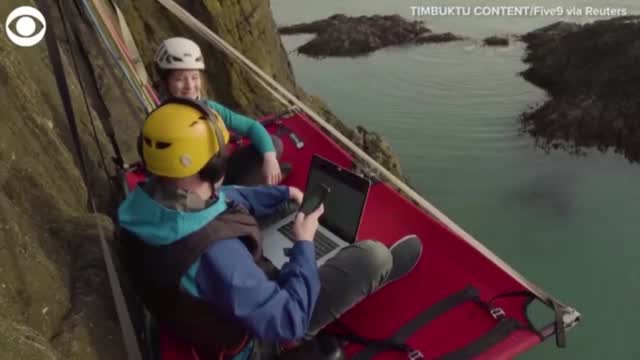 WATCH: Man Works Remotely From Side Of Cliff