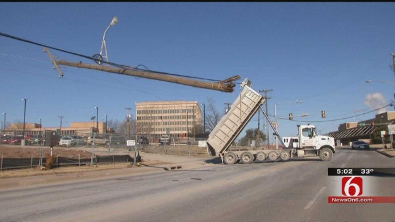 Dump Truck Knocks Out Power In Downtown Tulsa
