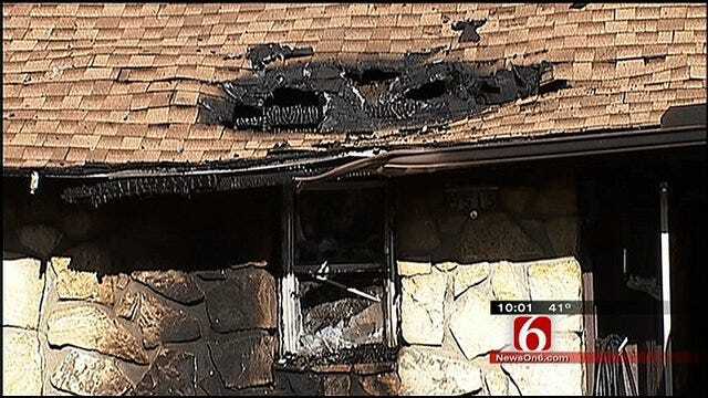 Tulsa Police Officers Rescue Homeowners From House Fire