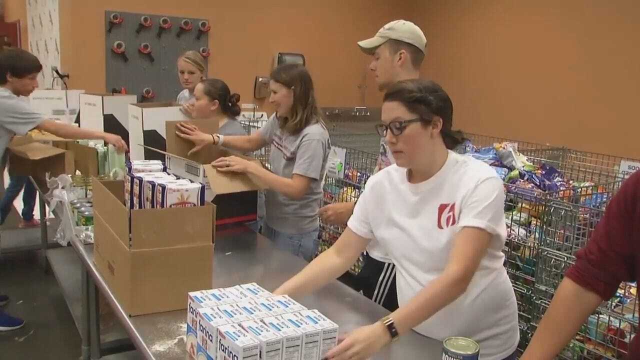 WEB EXTRA: News On 6 Volunteers Packing 'Food For Kids' Meal Boxes