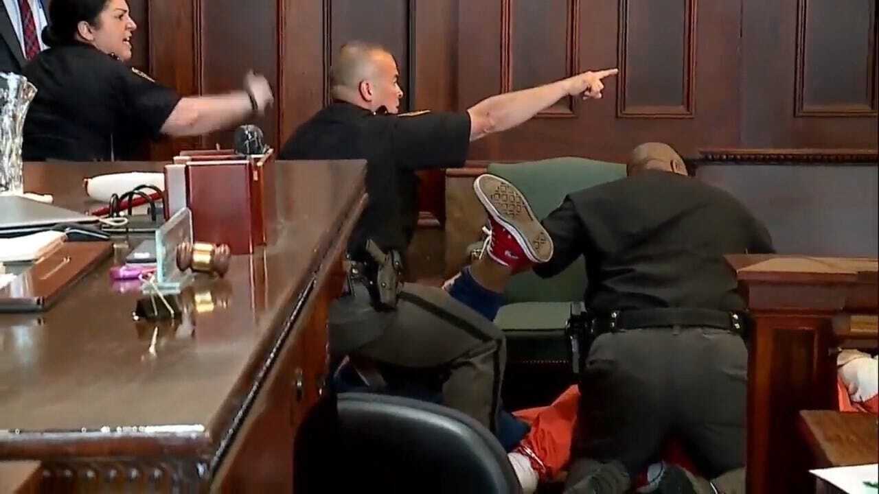 WATCH: 2 Brothers Attack Mother's Killer Inside Courtroom During Sentencing