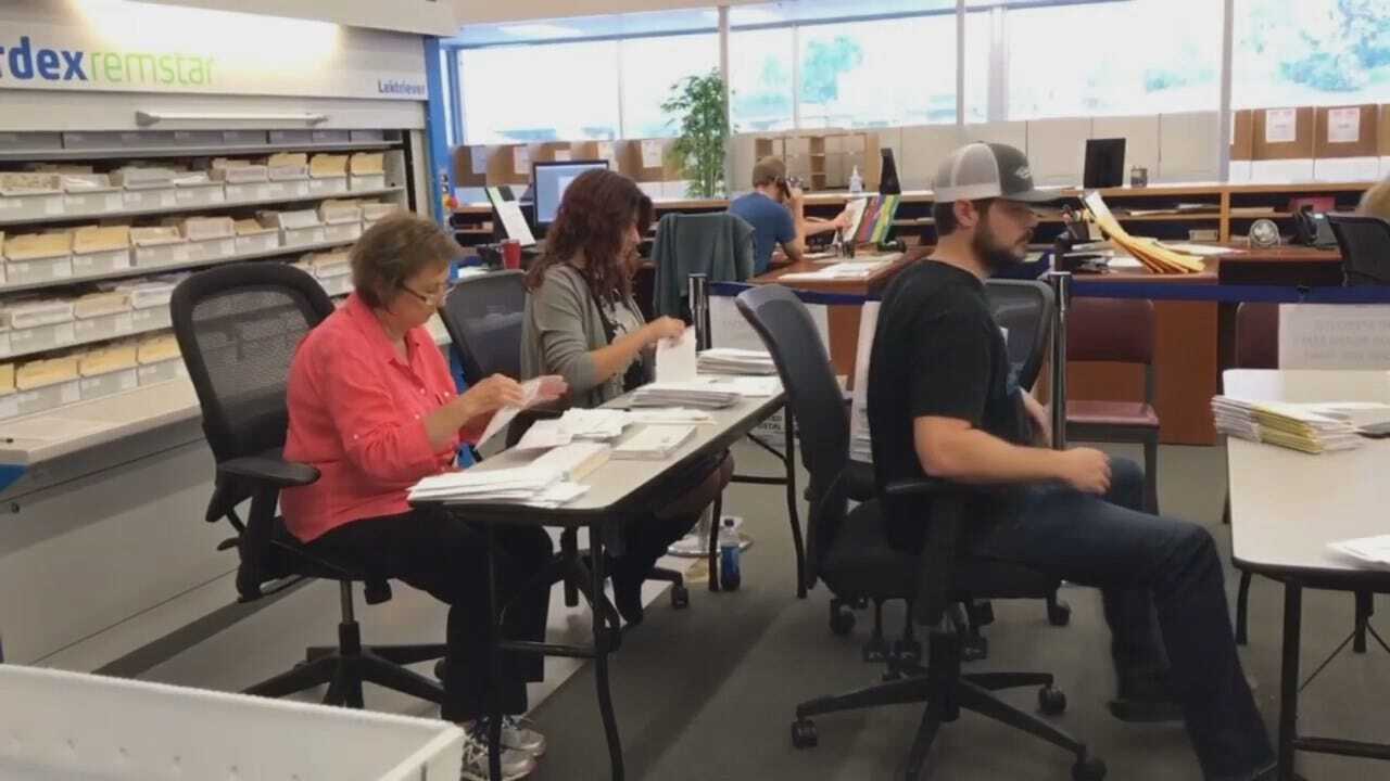 WEB EXTRA: Tulsa County Election Board Workers Counting Absentee Ballots