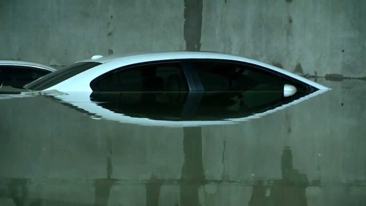 Flash Flooding Damages Vehicles In Dallas Airport Parking Garage