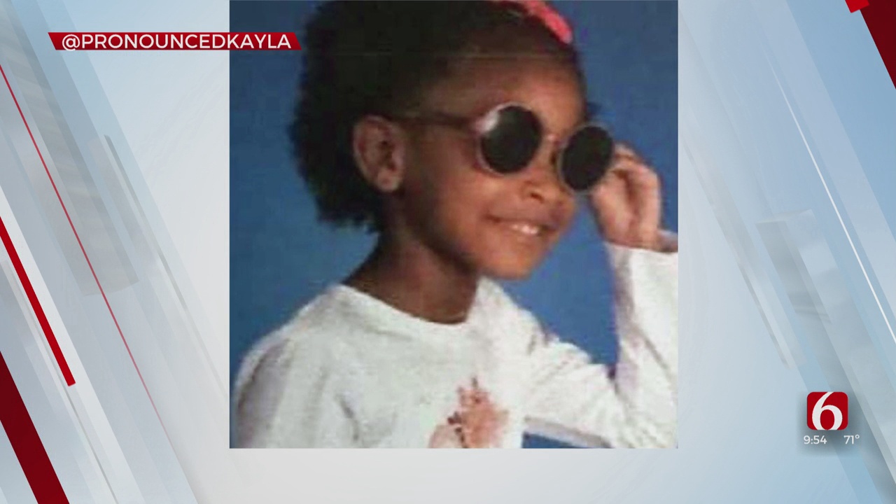 Young Girl Rocks Sunglasses For School Picture Day 