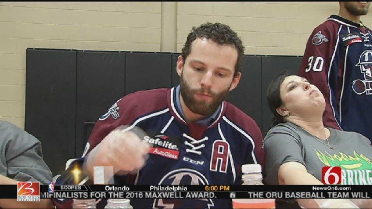 OILERS: Players Participate In Jalapeno Eating Contest To Promote Food Drive At Childers Middle School