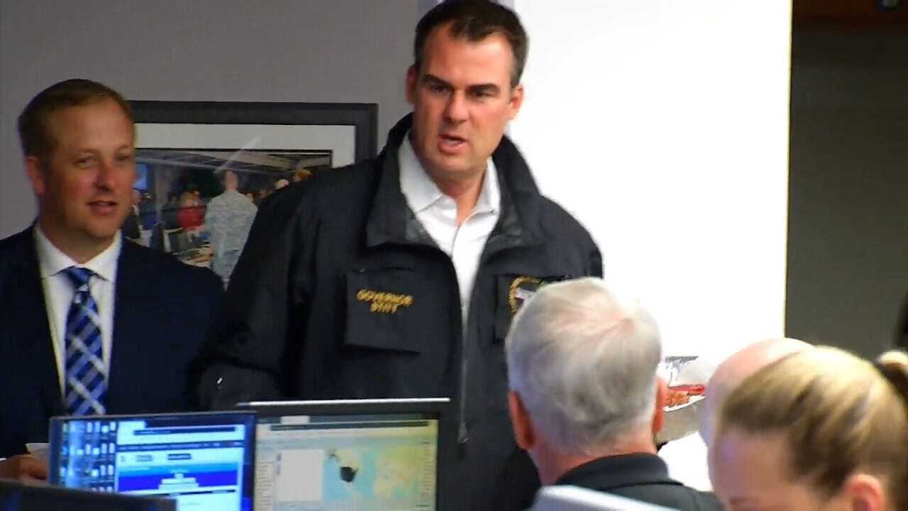 Gov. Stitt Hands Out Cookies To Workers At Emergency Management Command Center