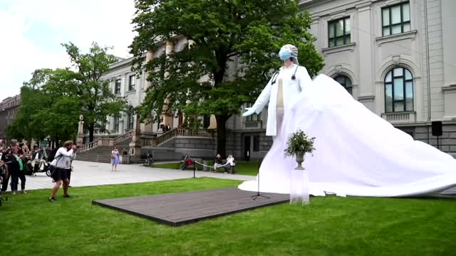 WATCH: Statue Of Medical Worker Unveiled In Latvia