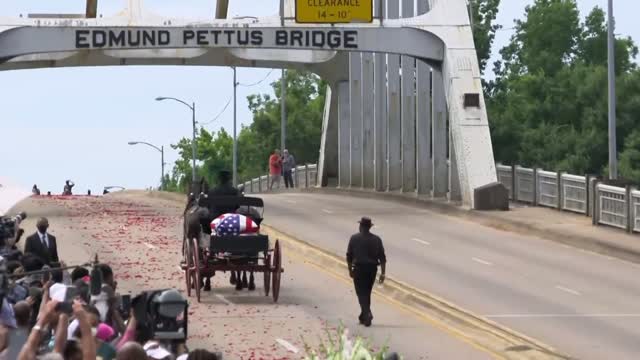 Rep. John Lewis Crosses Edmund Pettus Bridge In Selma A Final Time