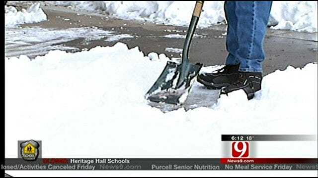 People Lending A Hand To Help Clear Snow