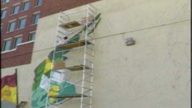 From The KOTV Vault: Artist Paints Flag Mural In Downtown Tulsa In 1984