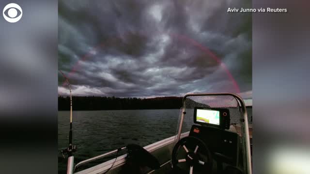 Fisherman Spots Rare Red Rainbow Over Lake In Finland