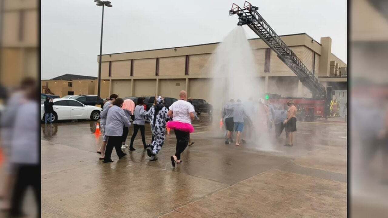 Del City Firefighters Help Students Take The Polar Plunge To Raise Money
