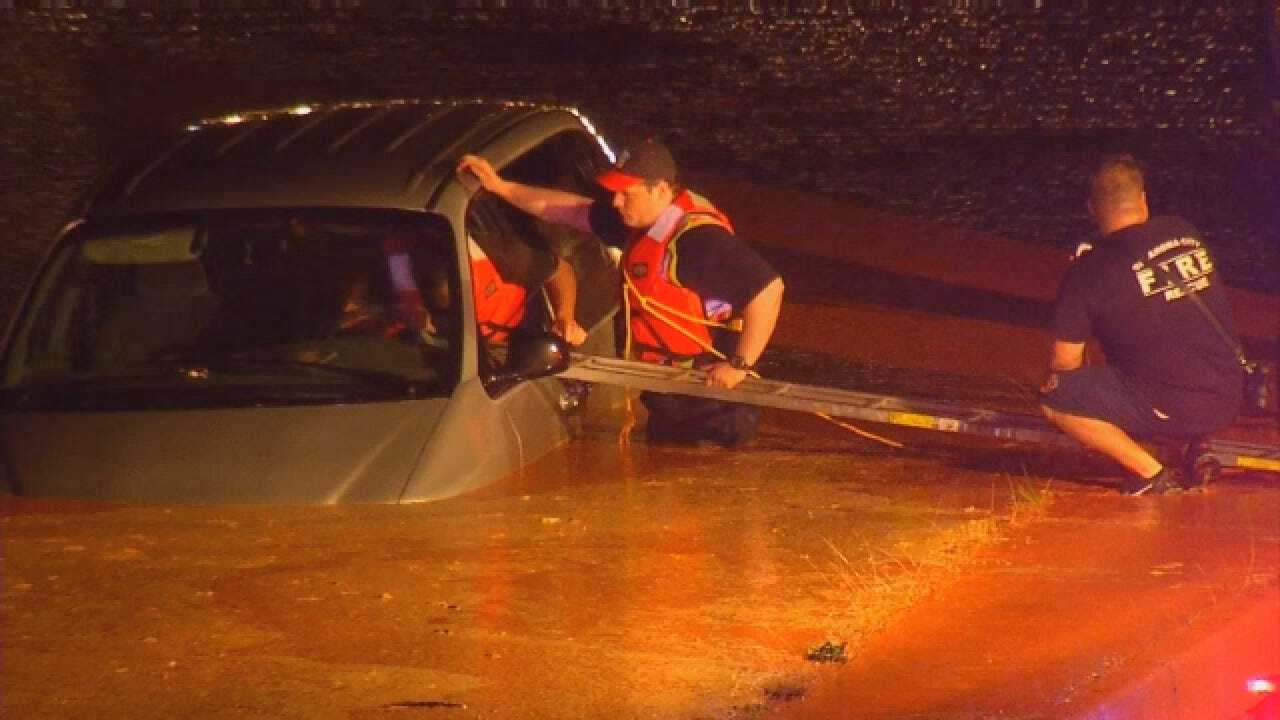 Man Rescued From Flooded I235.wmv