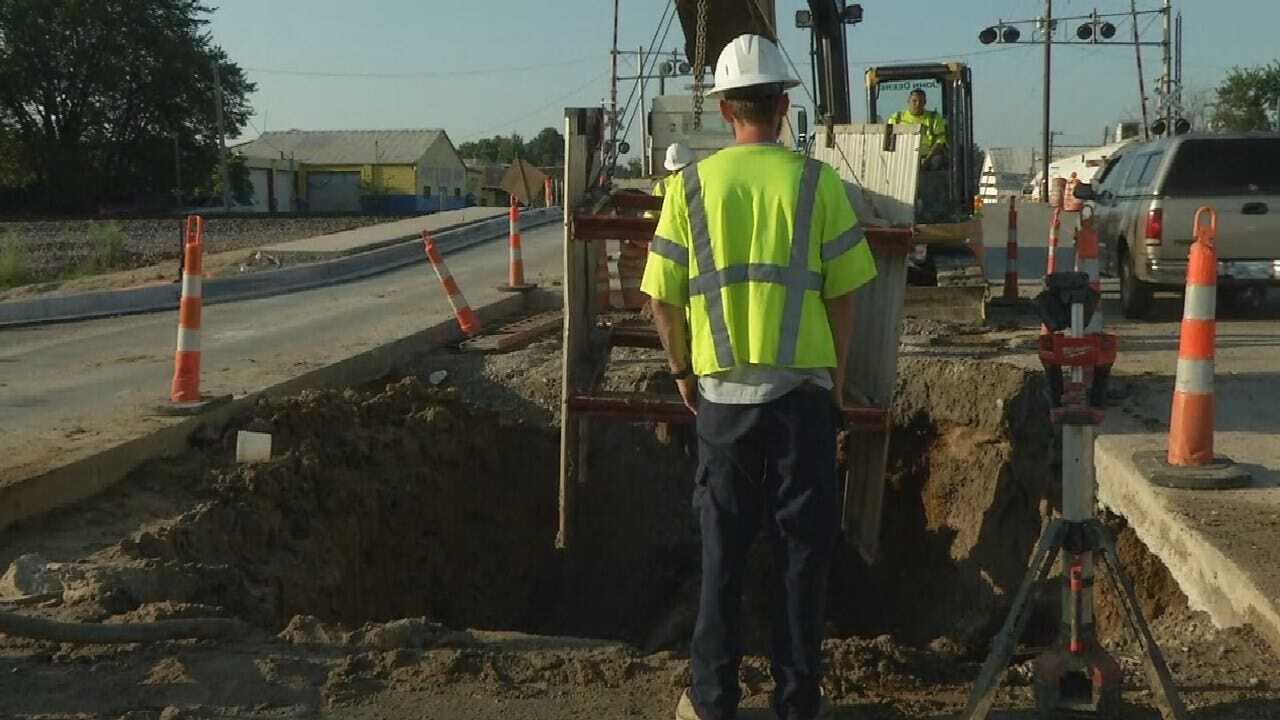 Tulsa Crews At Work Repairing Water Main Break From Pine To Archer
