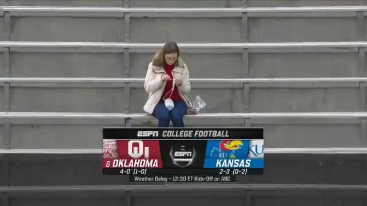 WATCH: ‘Crochet Lady’ Sitting Alone At OU, Kansas Football Game Going Viral