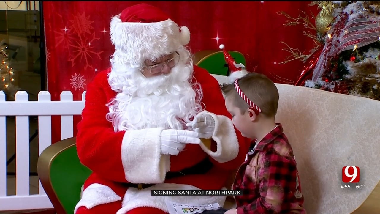 Signing Santa Makes Dozens Of Kids Smile For The Holidays