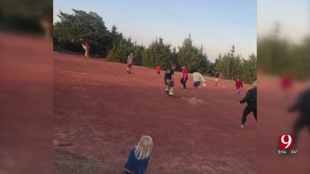 Children Kickoff Soccer Game With Oklahoma City Firefighters