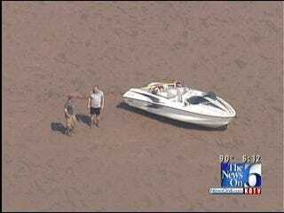 Helicopter Lifts Boat Stuck In Sandbar At Keystone Lake