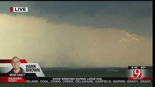 WEB EXTRA: News 9 Storm Tracker Hank Brown Captures Small Tornado Touchdown