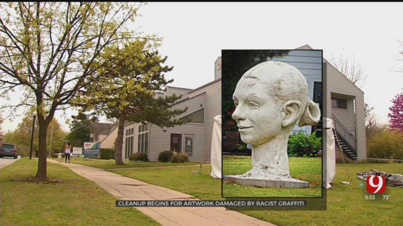 Artist Begins Cleanup Of Racist Vandalism On Norman Sculpture